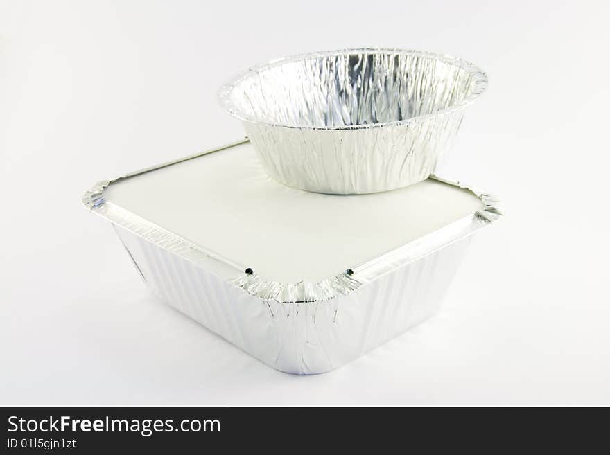 One square and One round catering trays on a white background. One square and One round catering trays on a white background