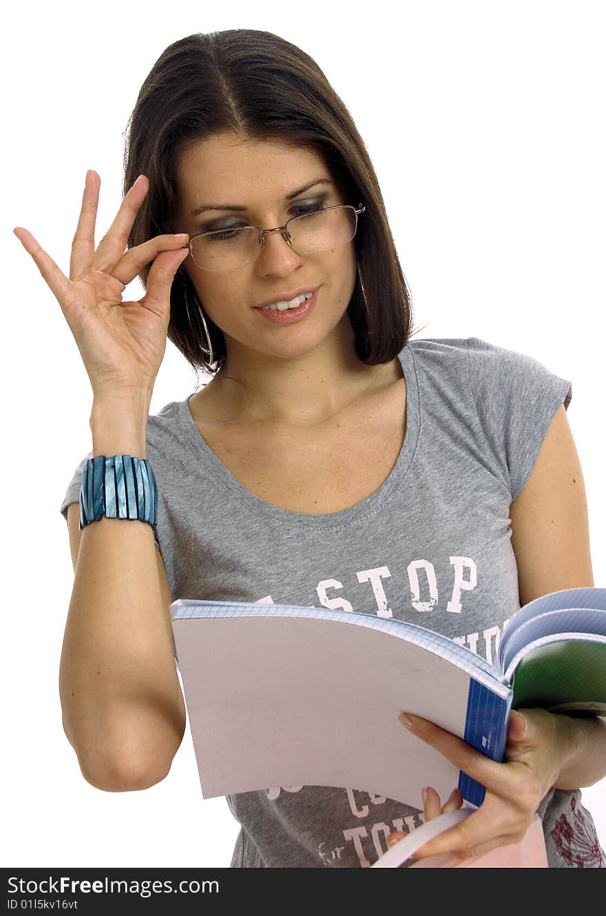 Half body view of college student or young teacher in casual wear, holding exercise books. Isolated on white background.