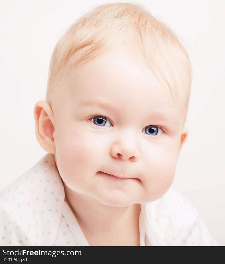 Cute small blond baby with blue eyes. Cute small blond baby with blue eyes