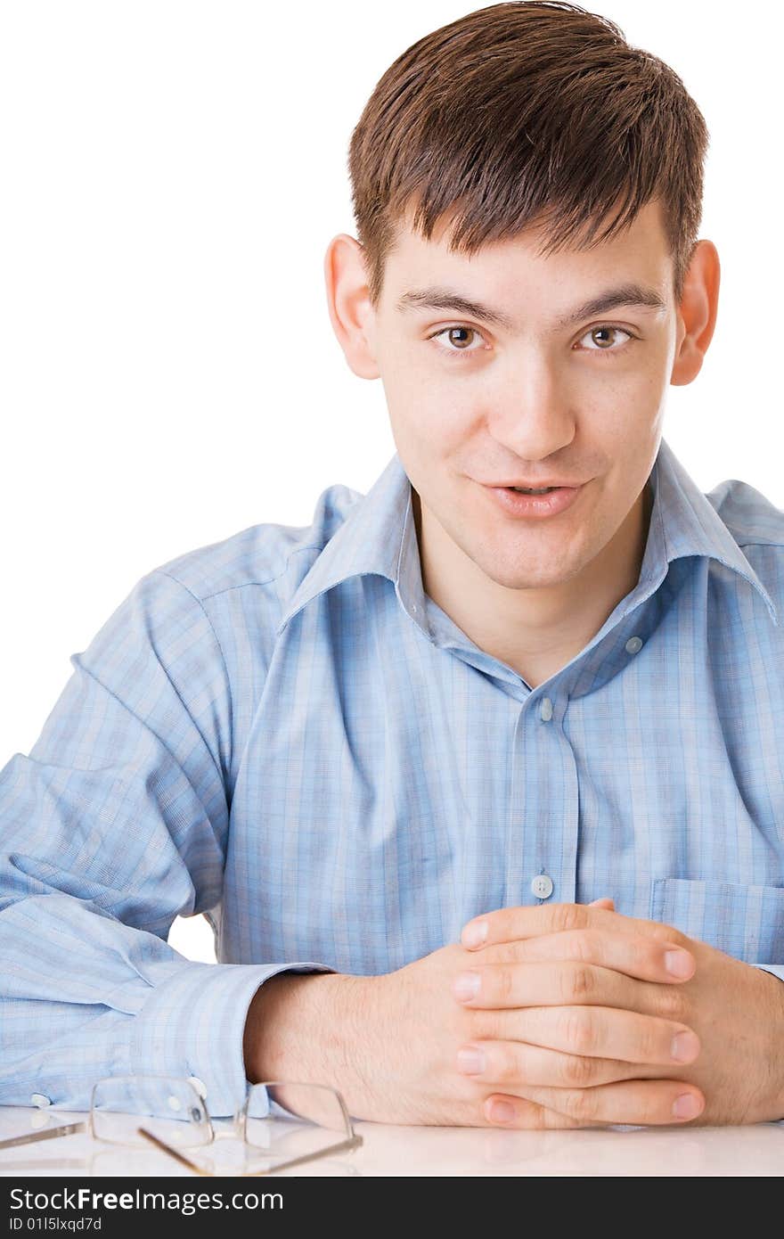 Young man in blue shirt on white background