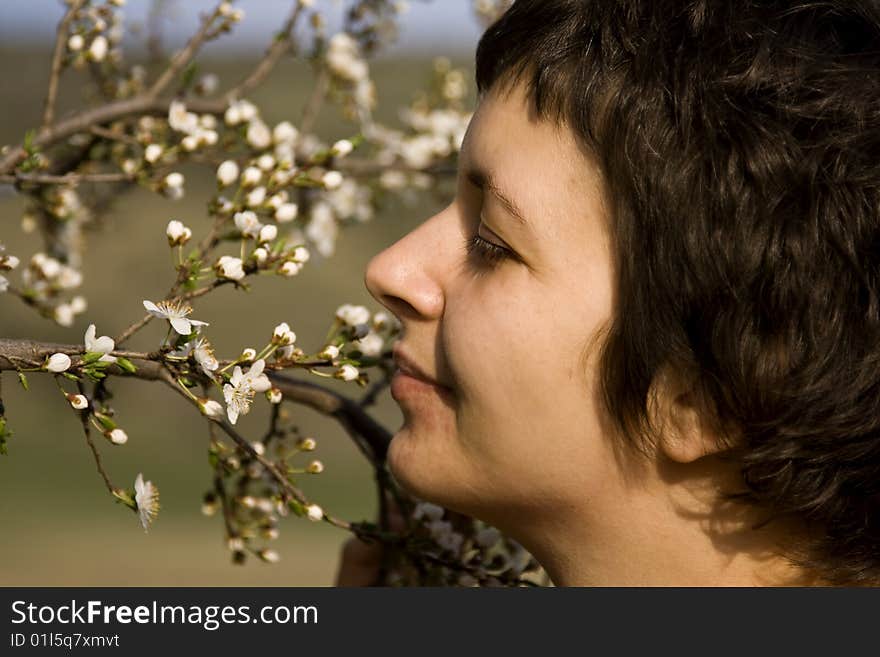 Beautiful Woman Amongst Spring Blossom