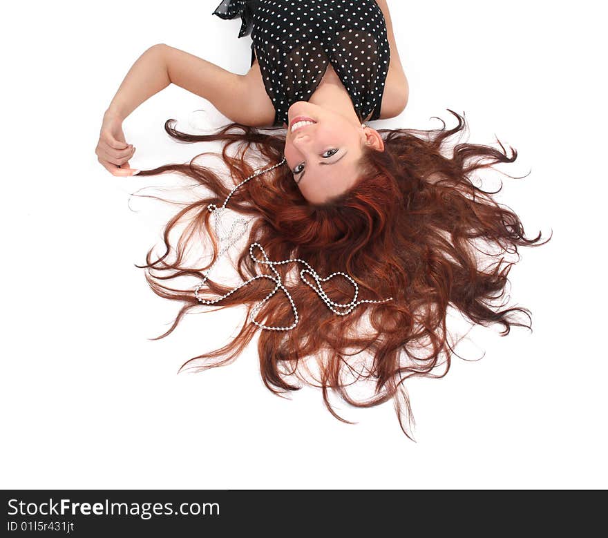 Beautiful long-haired girl on white