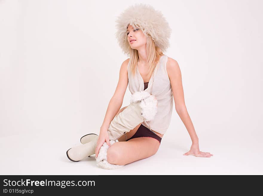 Romantic girl in white clothes, studio shot