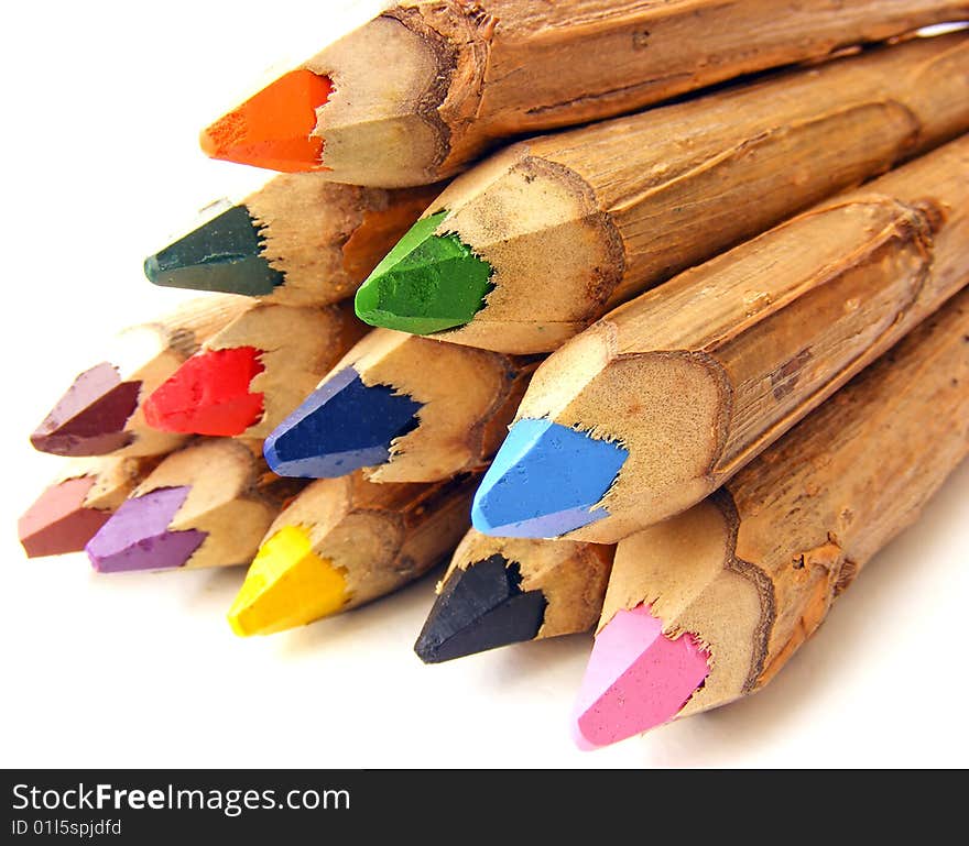 Handmade wooden color pencil laying in a peramid