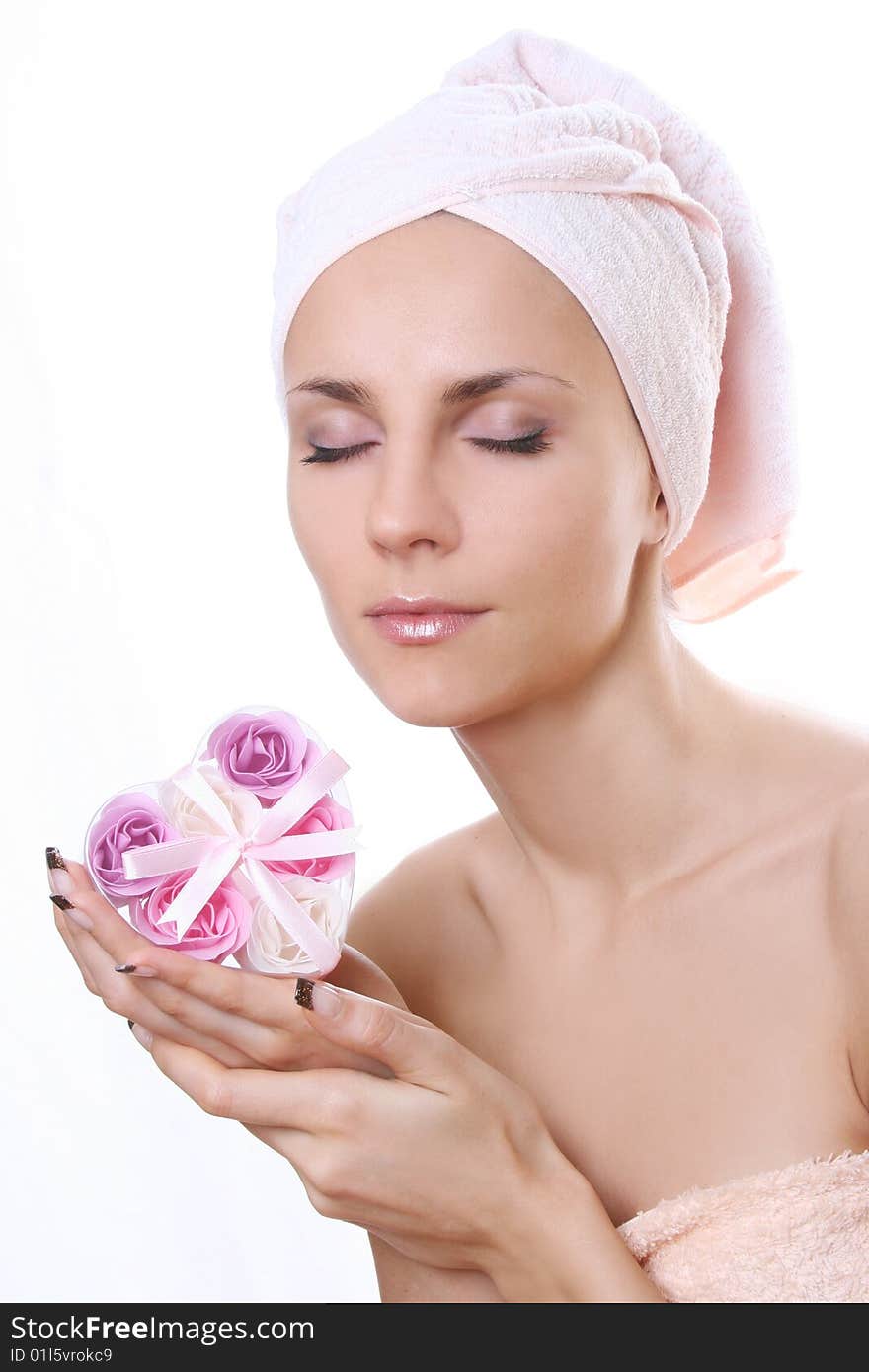 Beautiful young woman with soap-flowers. Beautiful young woman with soap-flowers