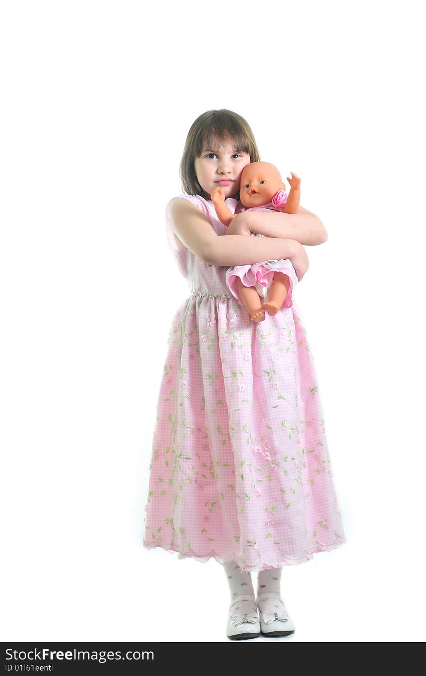 Little cute girl with doll isolated on the white background