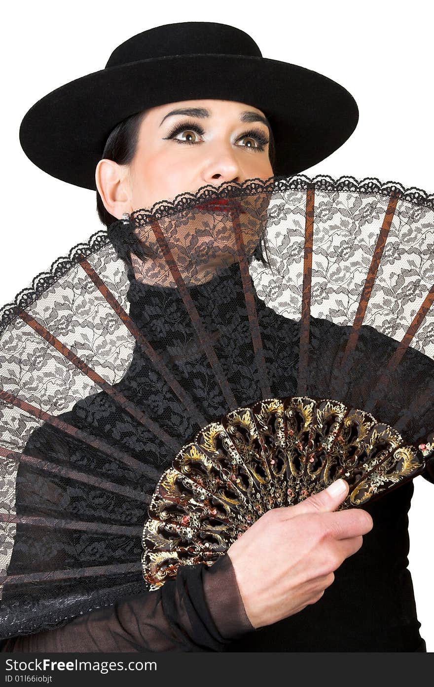 Spanish Dancer in a black costume with hat and accessories