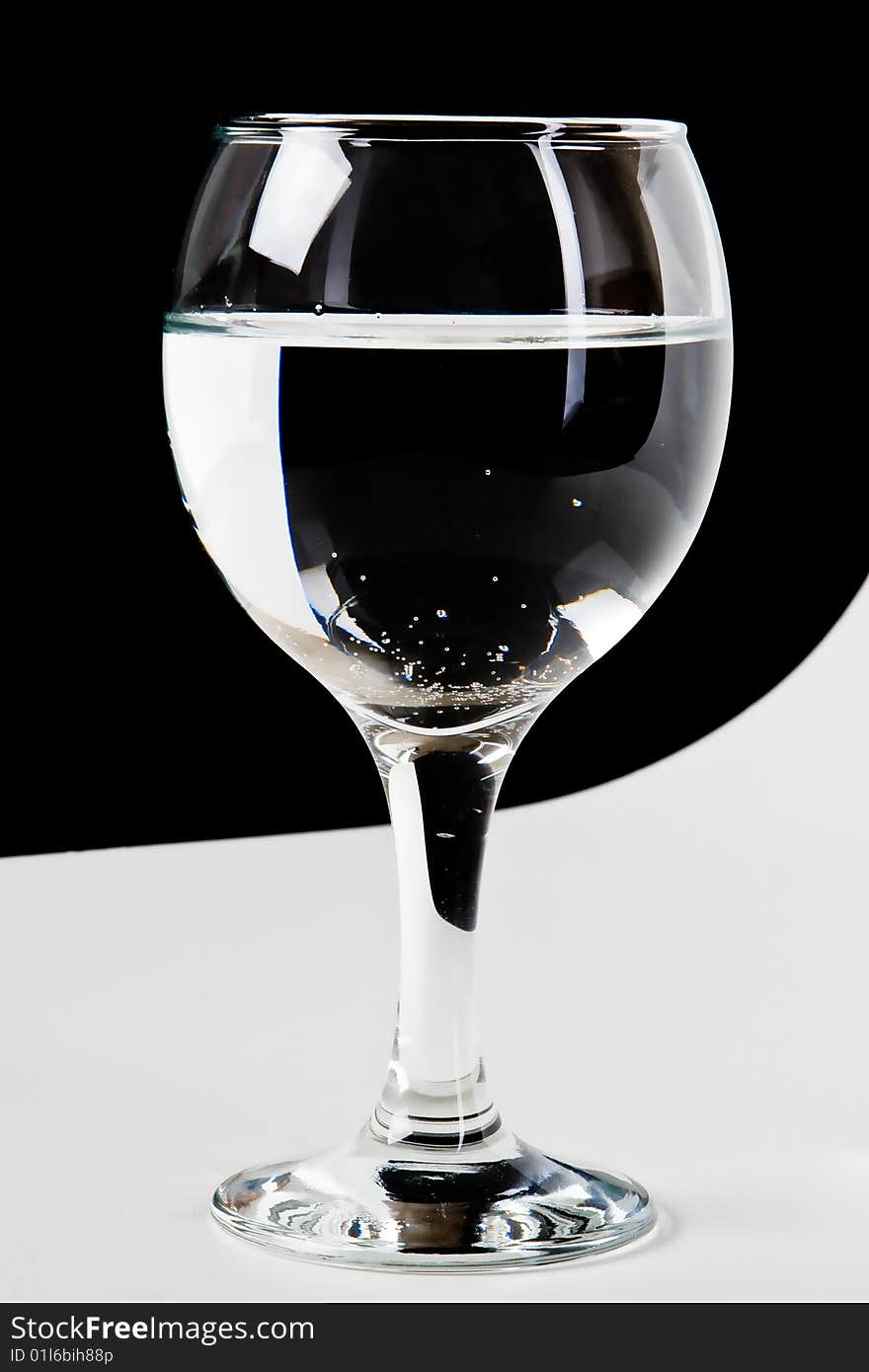 Beautiful wine glass with water. Beautiful wine glass with water