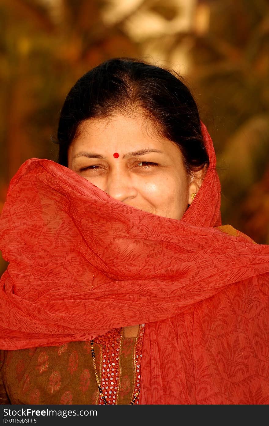 Traditional Indian woman hiding the face