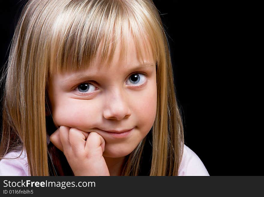 Blond Girl with big blue eyes on a black background