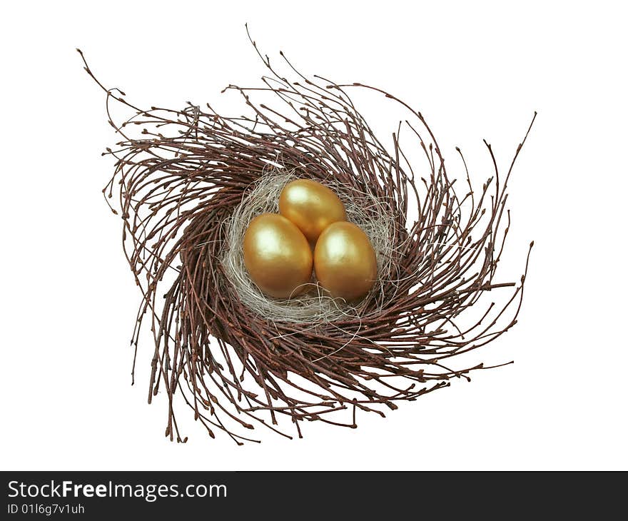 3 gold eggs in spiral birdsnest. 3 gold eggs in spiral birdsnest