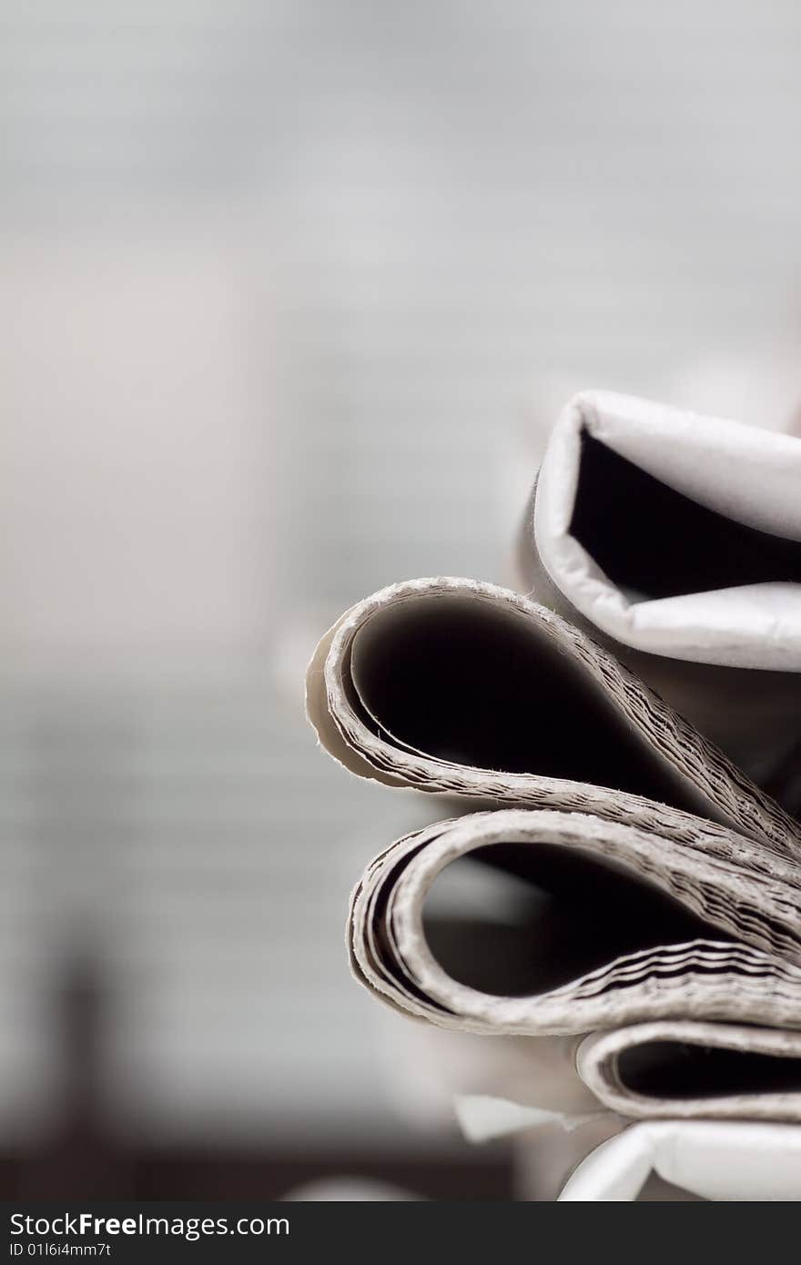 Pile of newspapers on the table