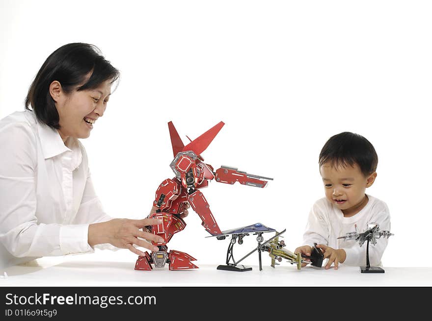 Mother and son play 3d Diy robot. Mother and son play 3d Diy robot