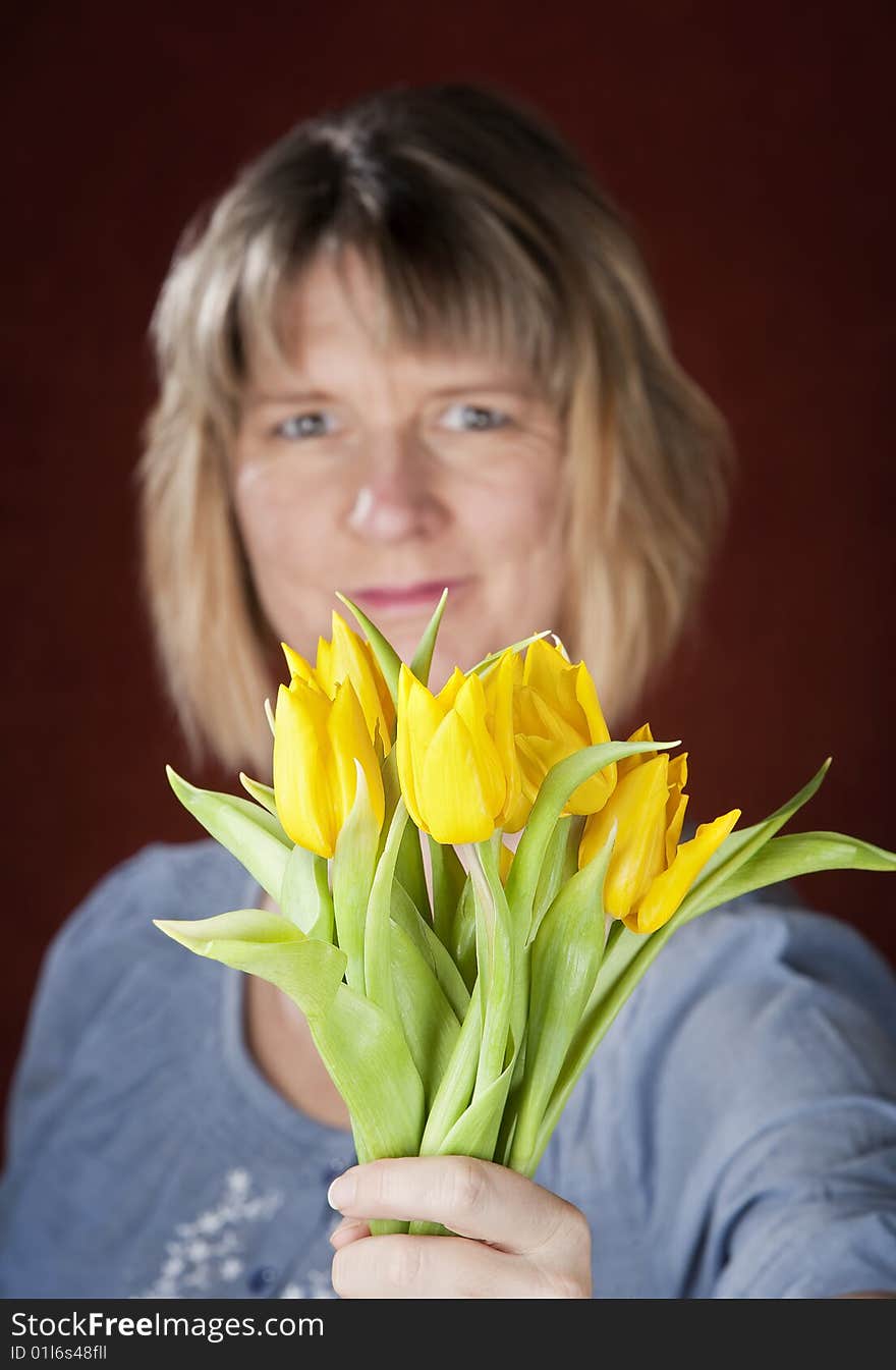 Woman With Yellow Tulips