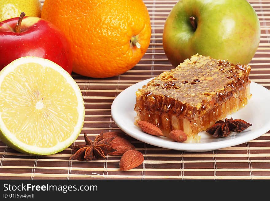 Still life of honey and fruit