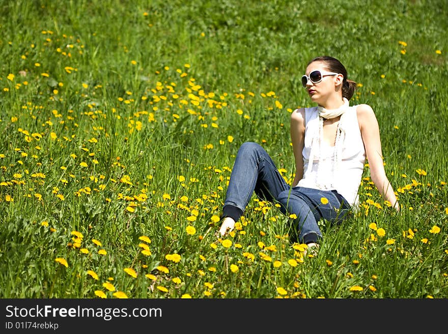 Young Woman With Sunglasses In Nature