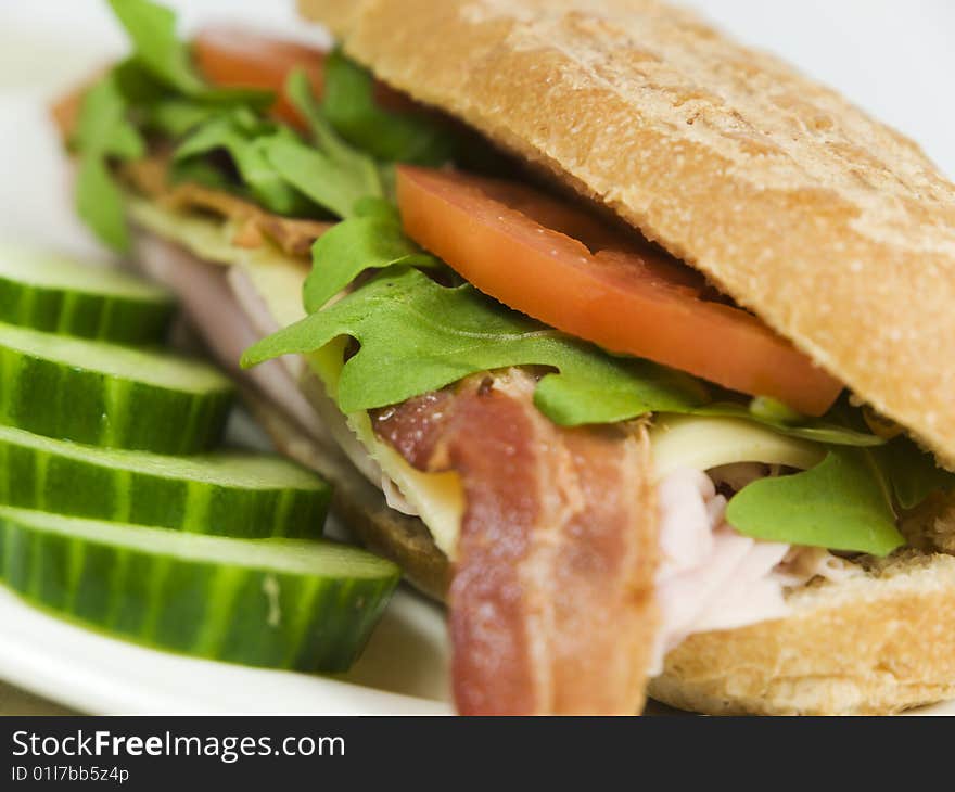 Fresh sandwich on a white plate. Fresh sandwich on a white plate