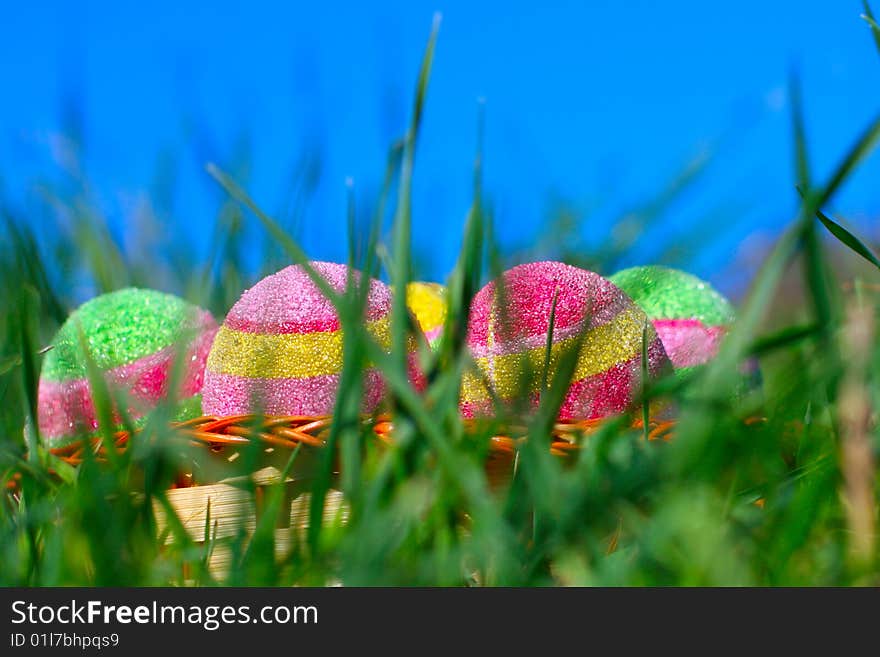 Easter eggs on a green grass