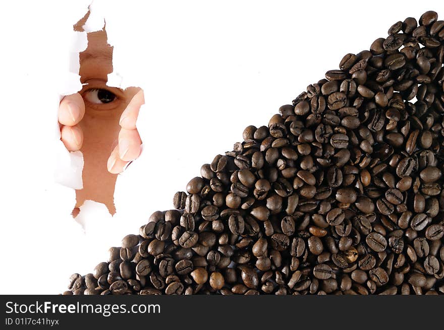 Coffee beans and a girls eye looking through the hole in background. Coffee beans and a girls eye looking through the hole in background