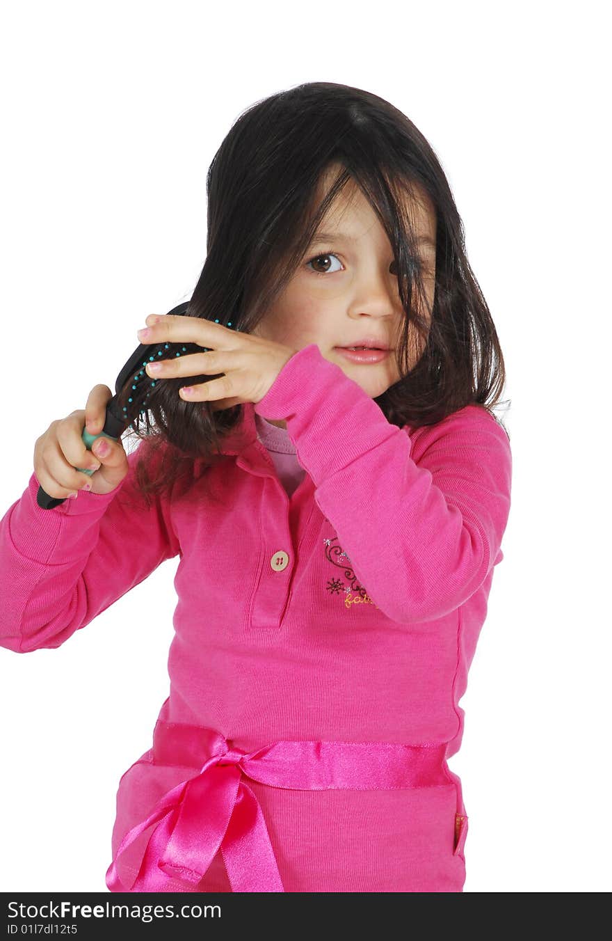 Little cute girl brush the hair isolated on white background