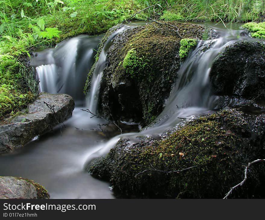 A beautiful mountain stream in north Sweden. A beautiful mountain stream in north Sweden.