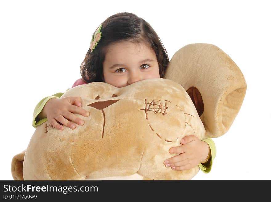 Little Girl Hugging A Teddy Bear