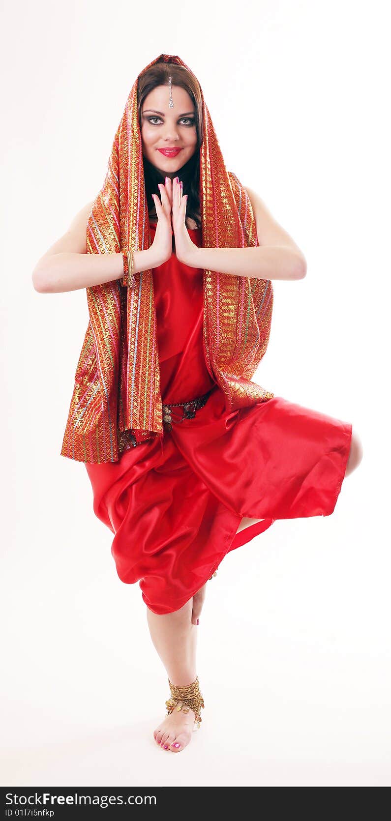 Girl in red dancing in indian style. Girl in red dancing in indian style