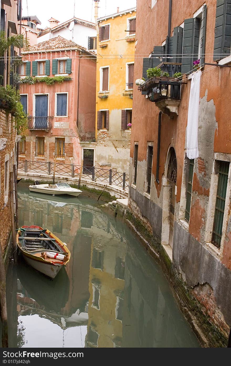 Canal in ancient Venice Italy with boats. Canal in ancient Venice Italy with boats