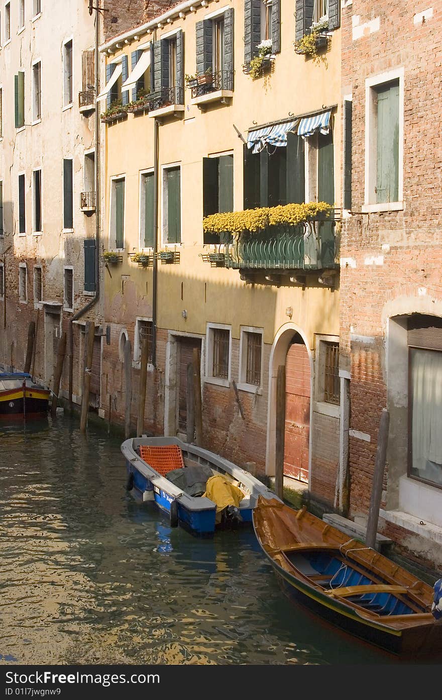 Canal in ancient Venice Italy with boats. Canal in ancient Venice Italy with boats