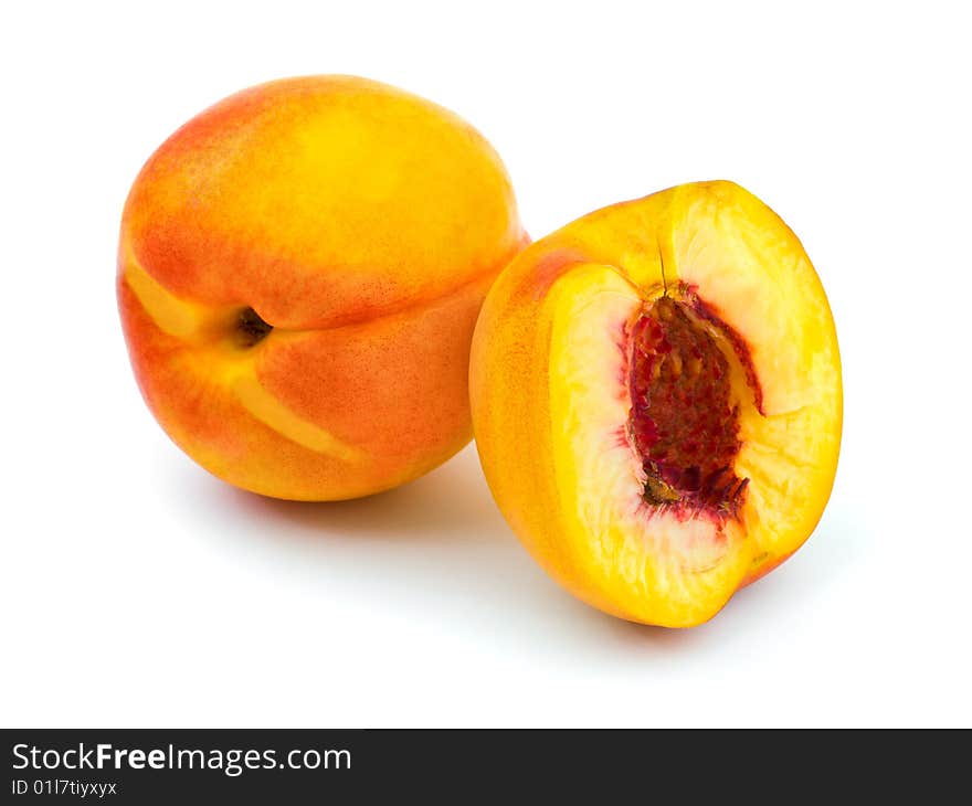 Ripe peach fruits isolated on white background