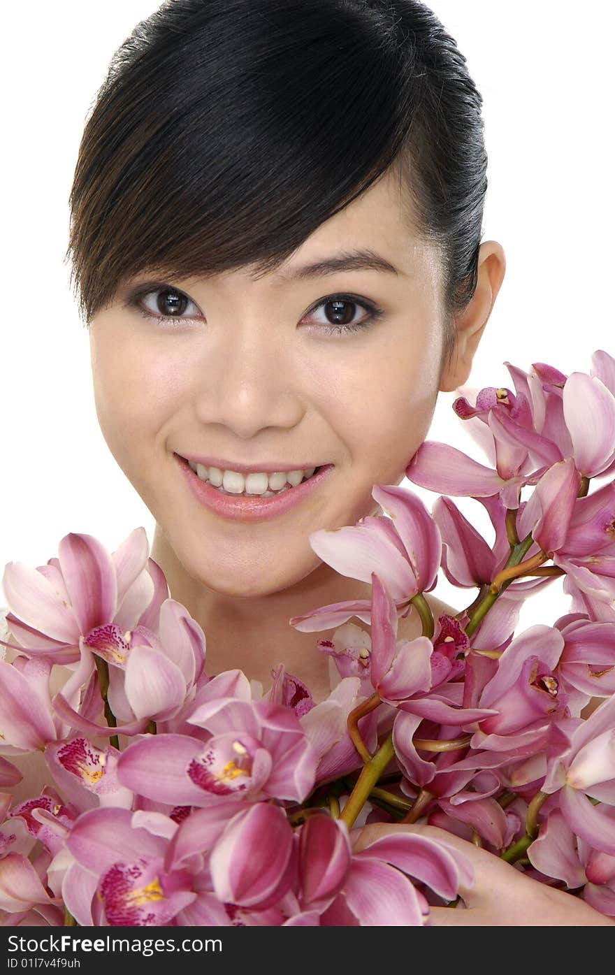 Portrait of woman with pink orchids. Portrait of woman with pink orchids