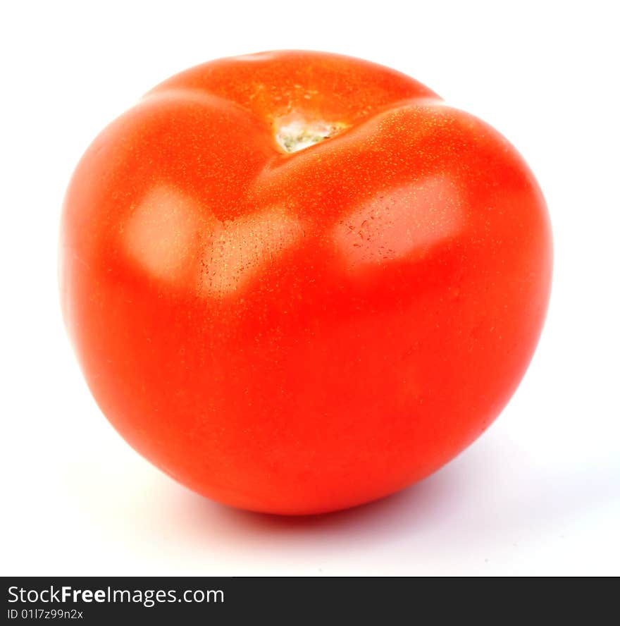 Close-up of red tomato on white background