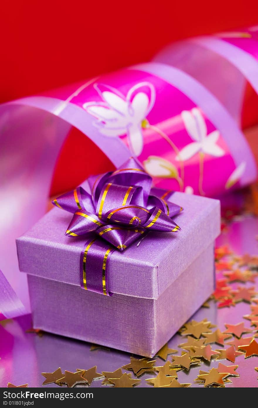 Violet gift box with ribbon