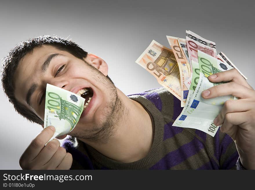 Happy Businessman With Bundle Of Euro Money