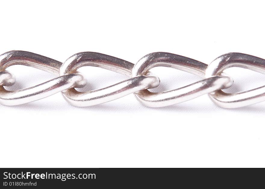 Silver chain on white background. conceptual image