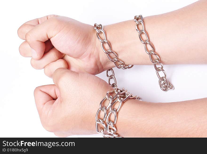 Hands with silver chain on white background.