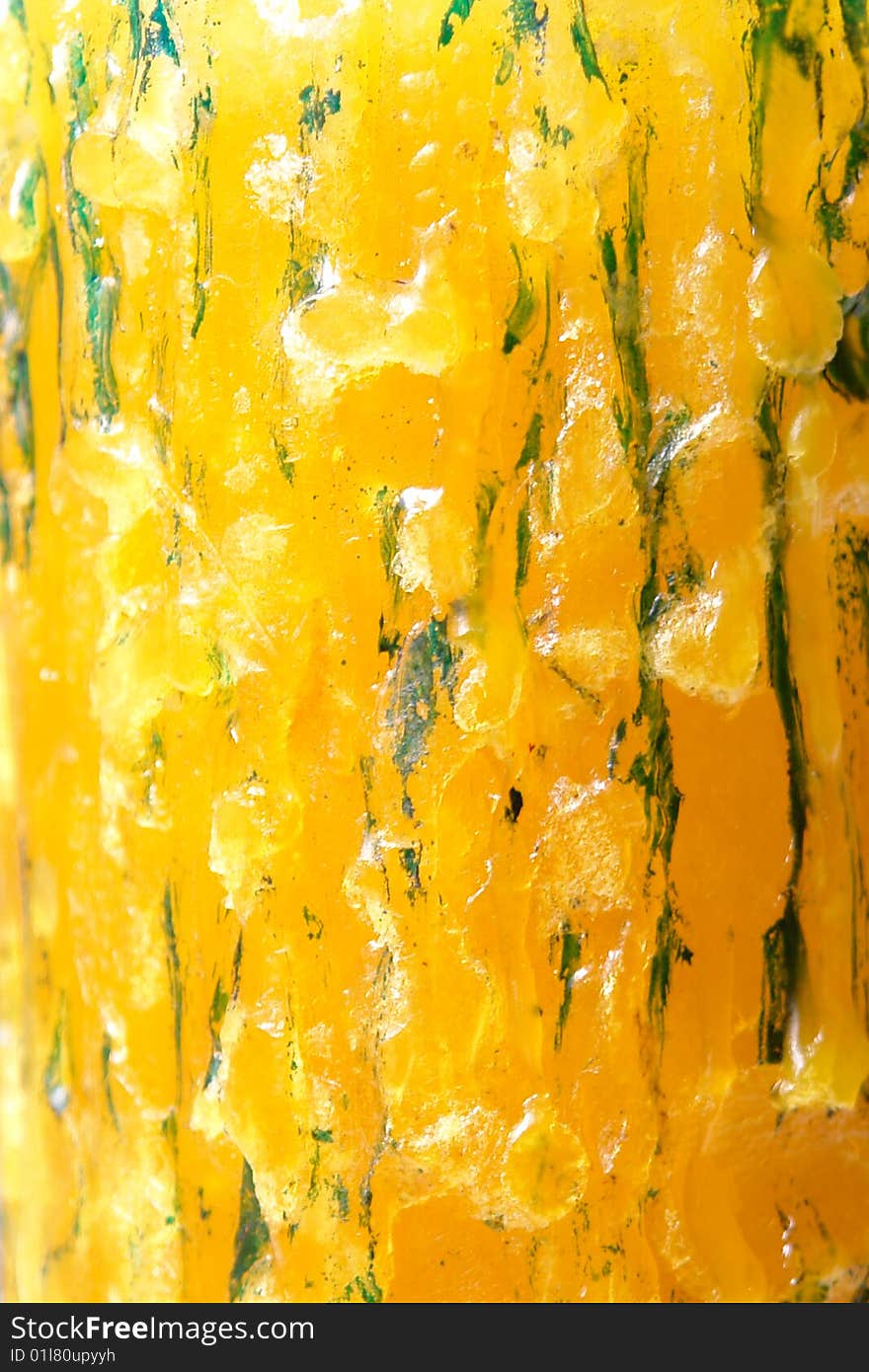 Yellow and green wax texture. abstract surface