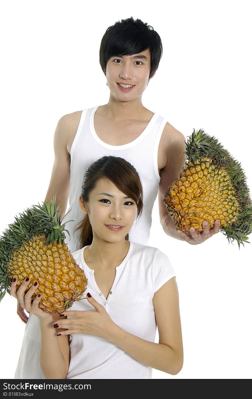 Young love couple with pineapple. Young love couple with pineapple