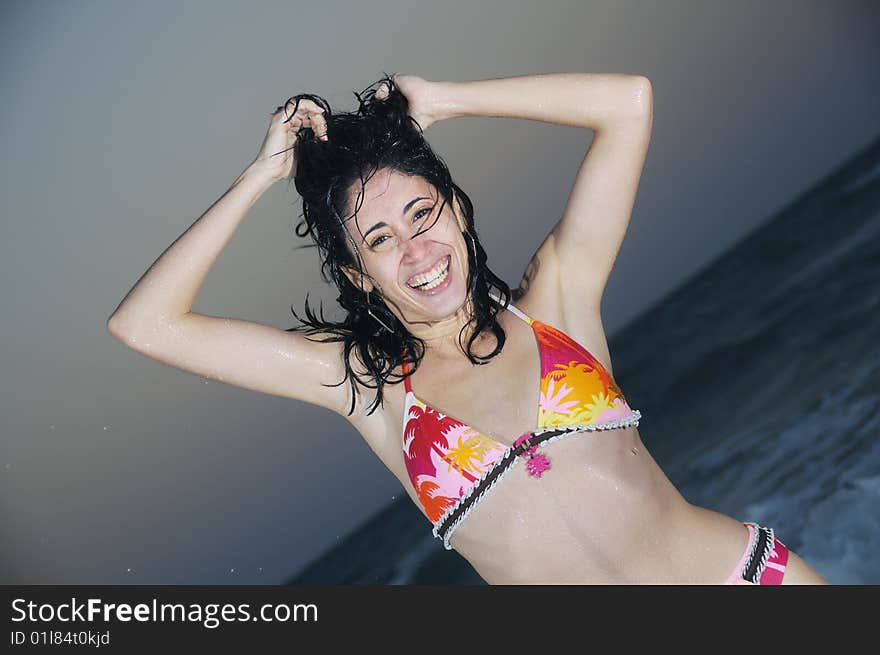 Portrait of young trendy hispanic model with happy expression on the beach. Portrait of young trendy hispanic model with happy expression on the beach