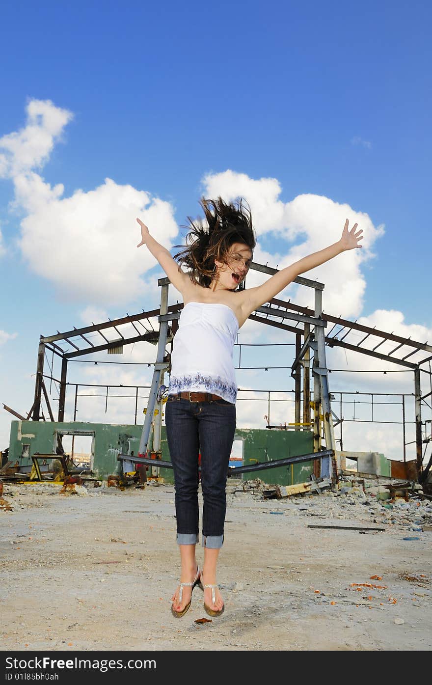 Portrait of young fashion female jumping of joy. Portrait of young fashion female jumping of joy