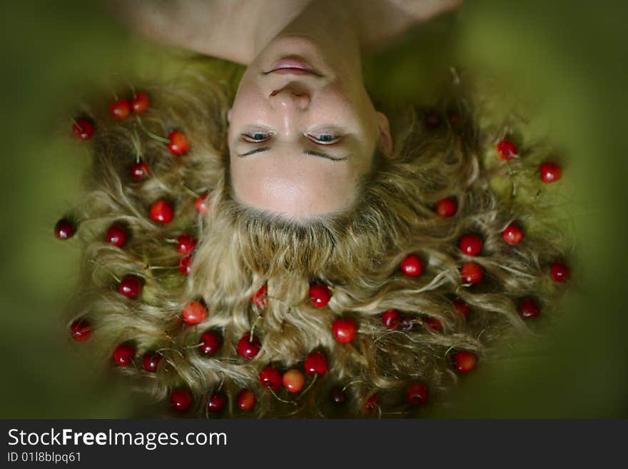 Woman with open hair and cherries. Woman with open hair and cherries