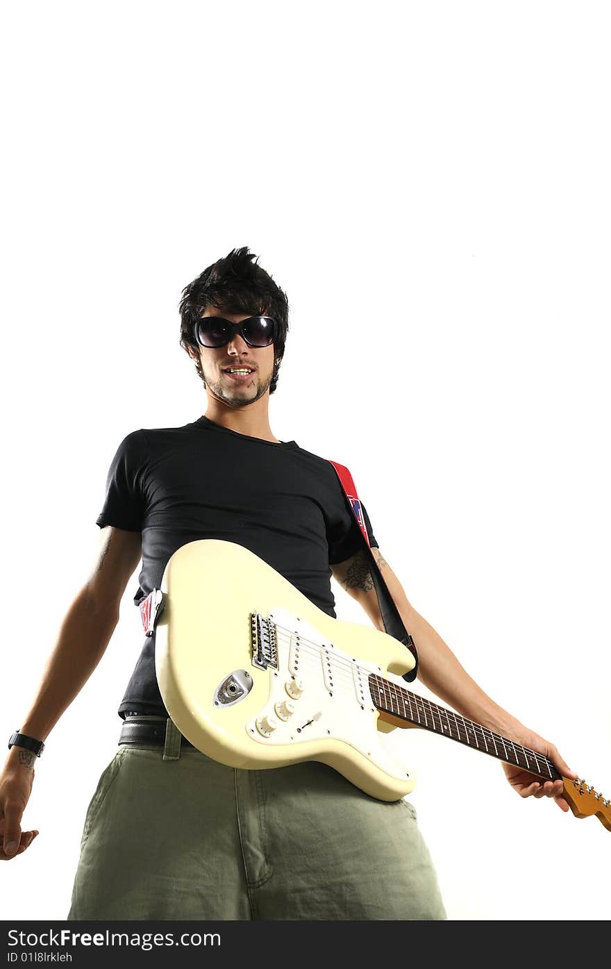 Portrait of young musician holding electric guitar - isolated