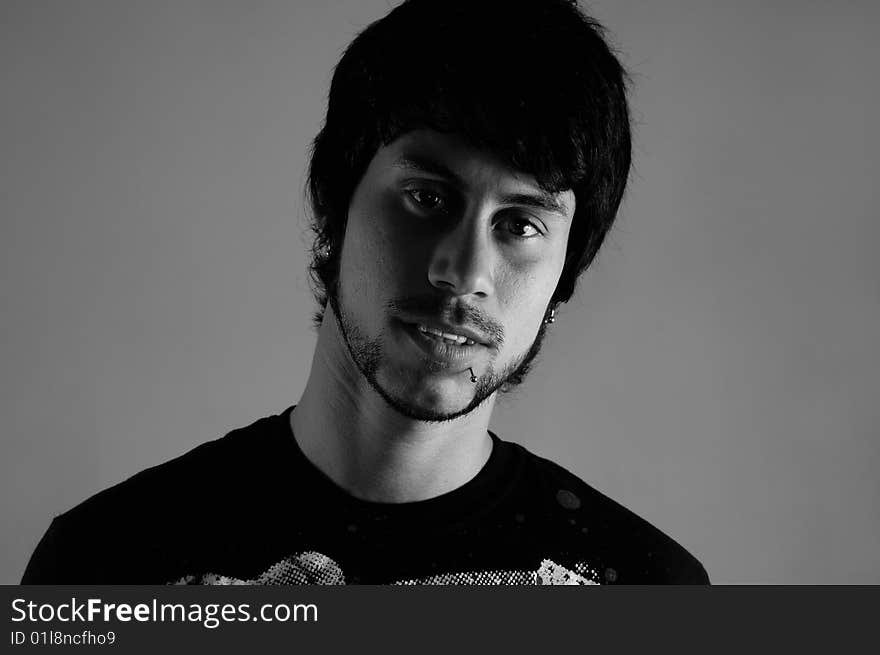 B&W portrait of young handsome hispanic man. B&W portrait of young handsome hispanic man