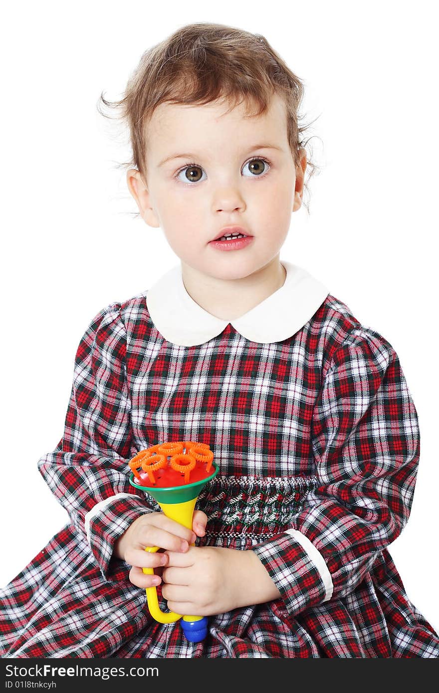 Little girl in checkered dress on white background