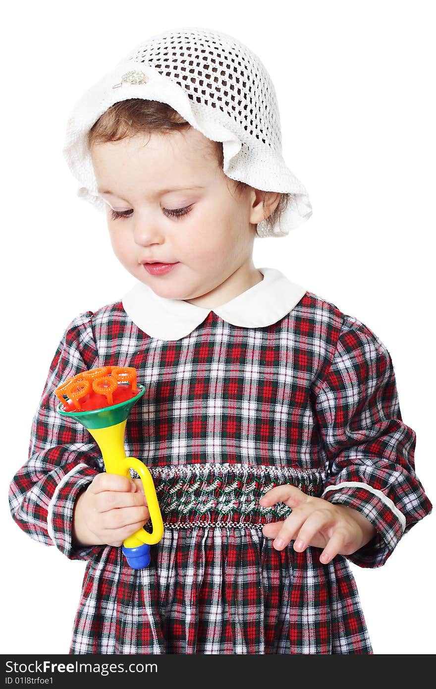 Little girl in checkered dress on white background