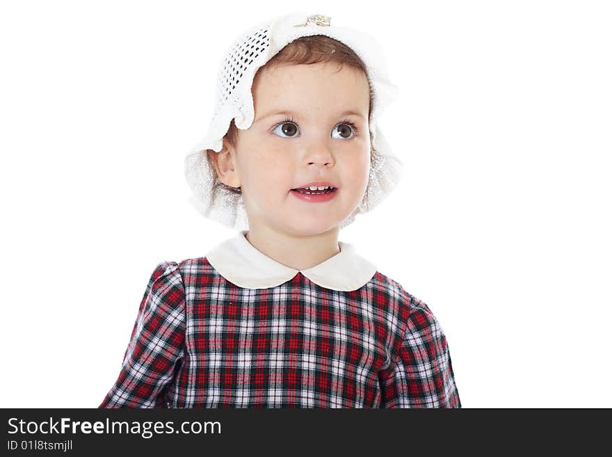 Little girl in checkered dress on white background