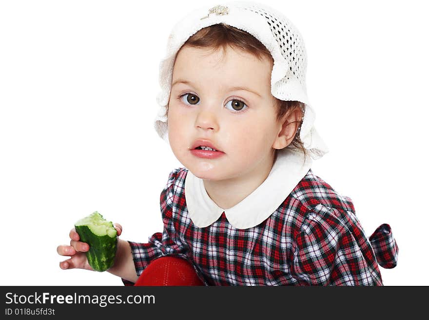 Little girl in checkered dress on white background