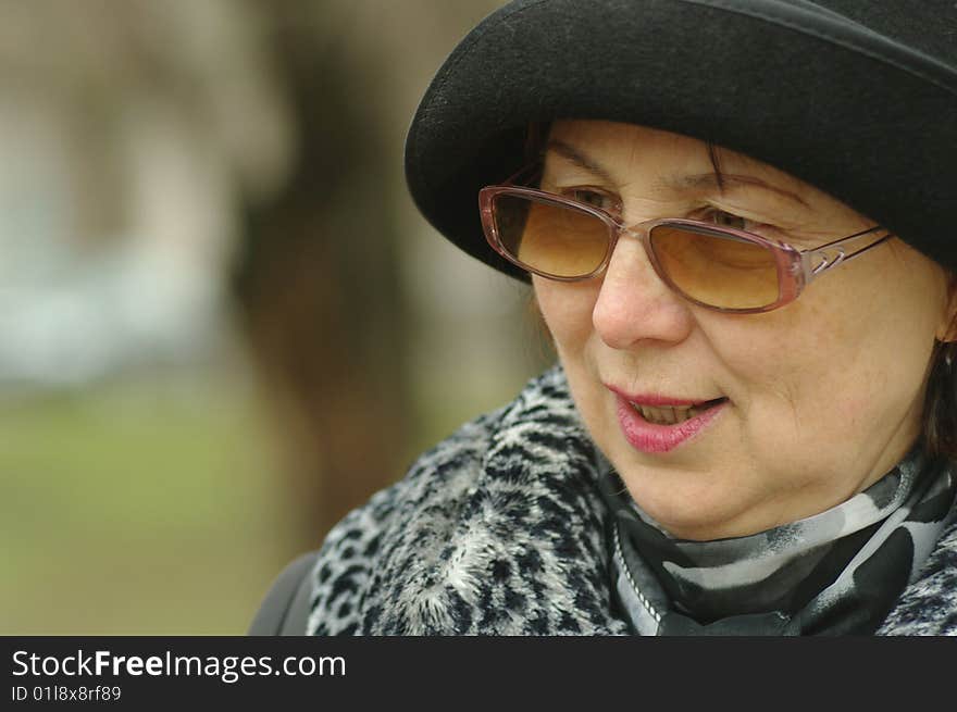 Portrait of elderly woman spectacled