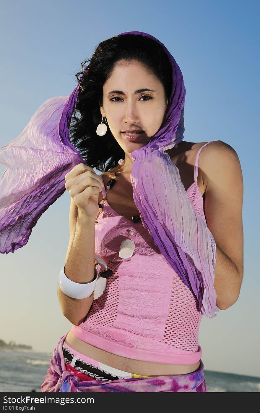 Portrait of young fashion woman on the beach. Portrait of young fashion woman on the beach