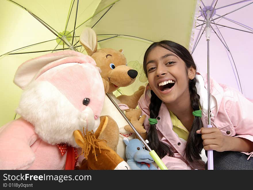 Girl gives protection to toy